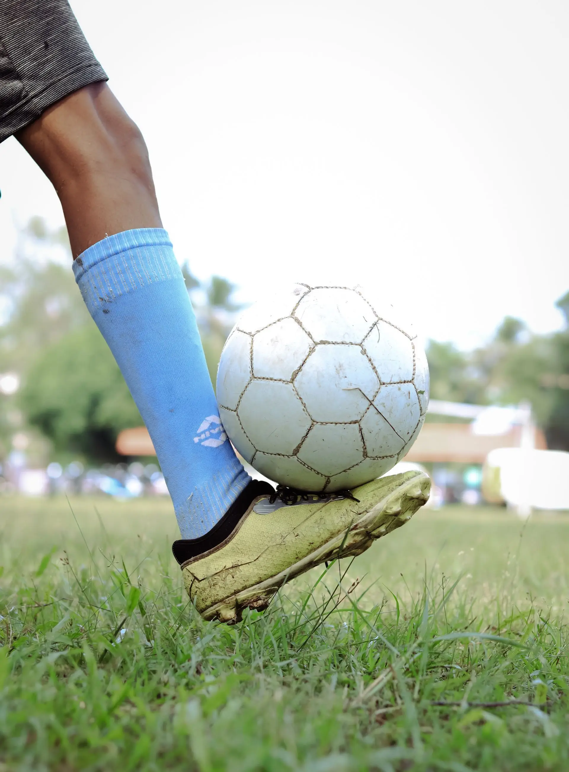 Soccer ball on the pitch line